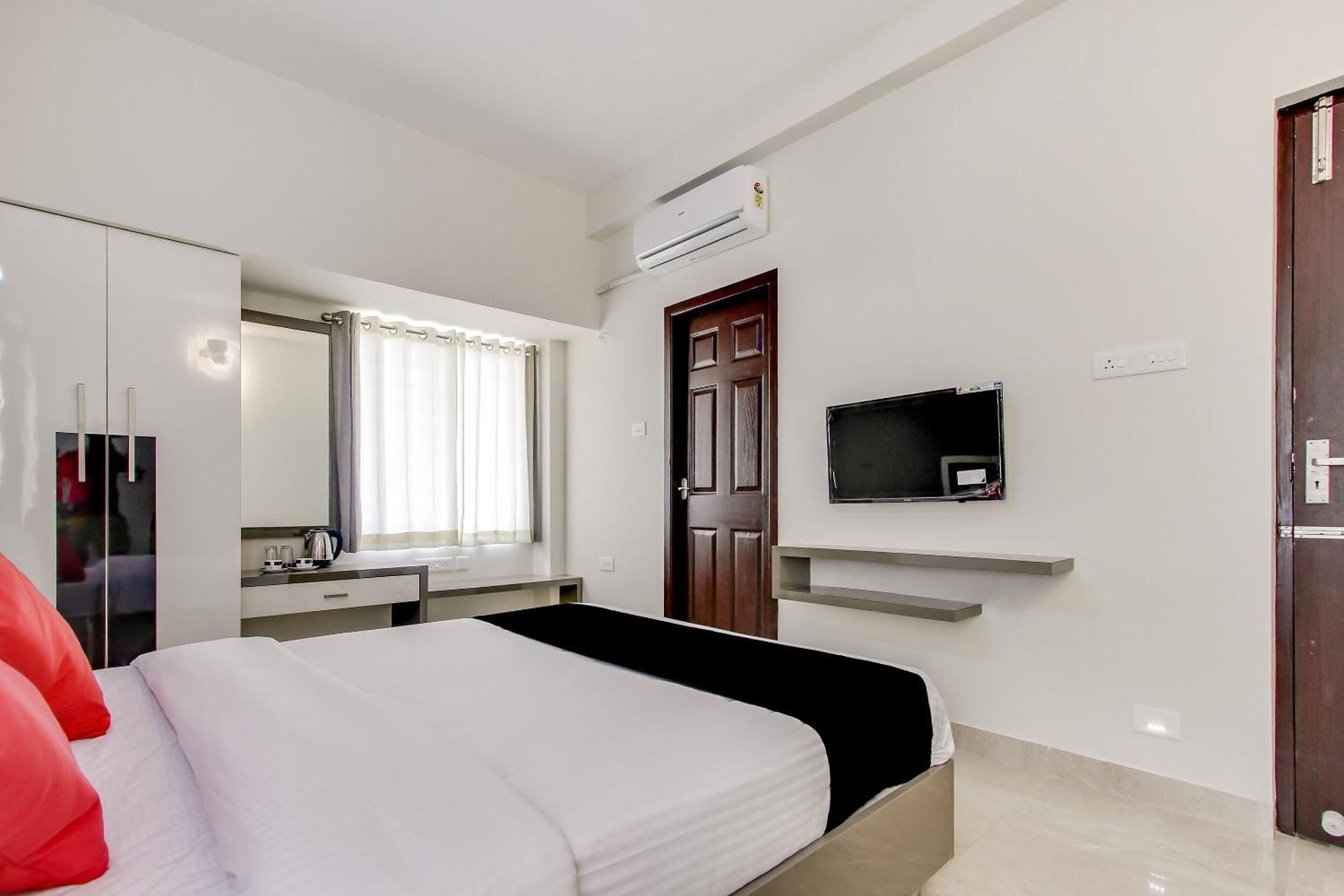 Capital O New Paradise Inn Irugur Bagian luar foto